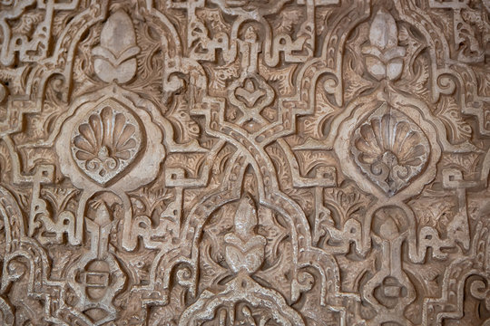 Detail of a 800 years old wall in arabic style. Alhambra, Granada. South of Spain