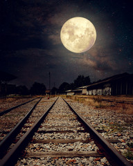 Wall Mural - beautiful countryside railroad with milky way star in night skies, full moon - retro style artwork w