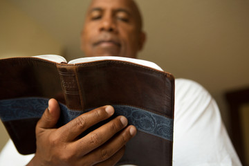 Man reading the Bible.