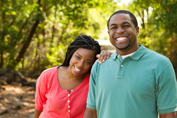 Happy couple embracing. Loving African American couple.