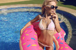© dariyad - fashion outdoor photo of gorgeous sexy woman with blond hair in elegant bikini relaxing beside swimming pool