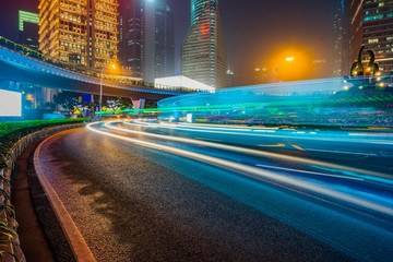 light trails at downtown district,shanghai china.