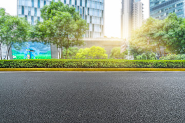 Canvas Print - clean asphalt road with city skyline background,china.