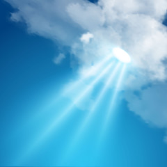 Realistic sun flare with clouds on blue sky.