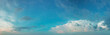 Panorama of the daytime sky with clouds