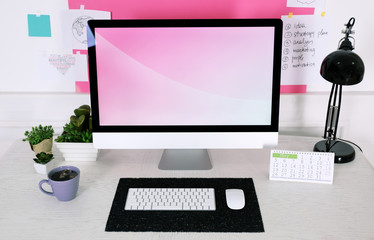 Canvas Print - Stylish workplace with computer and interior decorations