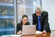 © Anton Gvozdikov - Mature businessman helping a young employee