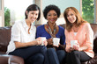 © digitalskillet1 - Diverse group of friends having coffee
