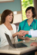 © digitalskillet1 - Doctor shaking hands with a patient.