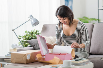 Woman unboxing a parcel