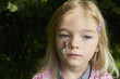 © Petr Bonek - Portrait of cute blond child girl with snail on her face