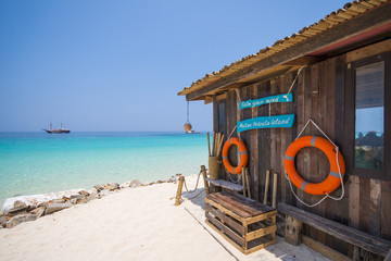 wooden hut on the beach at Mai-Ton Island