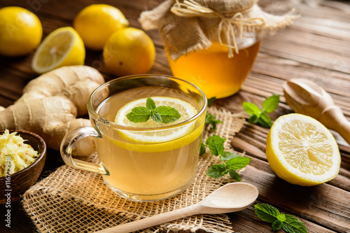 Fotografie, Obraz Ginger root tea with lemon, honey and mint