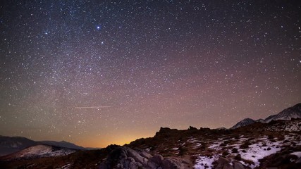 Wall Mural - Amazing time-lapse of the stars moving across the night sky.