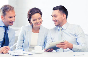 Canvas Print - business team having fun with tablet pc in office