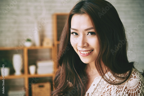Fotografie, Obraz Face of attractive Vietnamese girl looking at camera