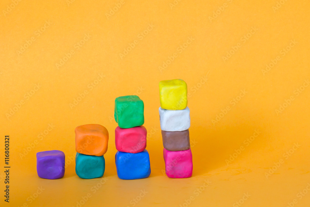 Modeling Clay Stack blocks of colorful modeling clay, stack of cube Stock Photo | Adobe Stock