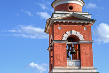 Church Bell Tower Close-Up Against A Blue Sky