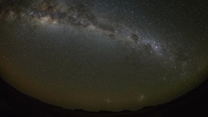 Wall Mural - Time Lapse of the stars moving across the night sky. Shot in Namibia.