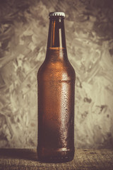 Canvas Print - Beer in bottle with ice drops