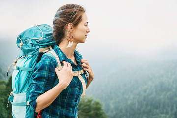 Beautiful hiker young woman with backpack