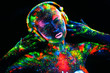 © davit85 - Topless girl painted in UV powder as a DJ panel.