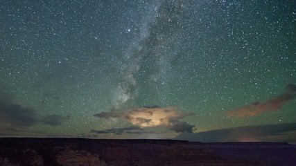 Wall Mural - Amazing time-lapse of the night sky above the Grand Canyon.