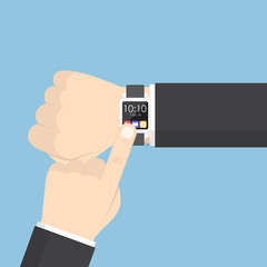 Poster - Businessman hand using smartwatch on his wrist