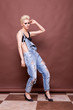 © DC Studio - Fashion style woman full body in bra and jeans