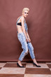 © DC Studio - Girl in bra and jeans in full body image