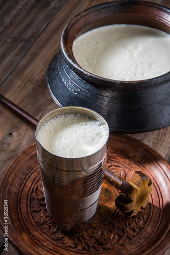Fotografia, Obraz Indian sweet Lassi made up of milk, curd, sugar and salt mixed with ice cubes, s