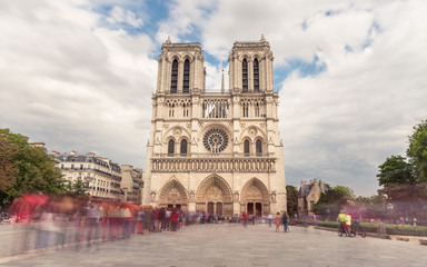 Wall Mural - Notre Dame de Paris. France. Ancient catholic cathedral on the quay of a river Seine. Famous touristic architecture landmark in summer
