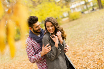 Young couple in the autumn park