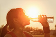 © FocusStocker - Female drinking a bottle of water