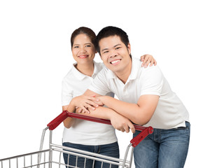 Wall Mural - asian couple with shopping cart