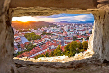 Wall Mural - Ljubljana sunset through stone window aerial view