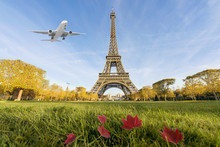 Airplane Flying Over Eiffel Tower, Paris, France. 