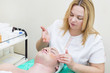© lester120 - man in the mask cosmetic procedure in spa salon
