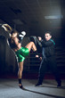 © Alen Ajan - Boxing girl doing knee kick