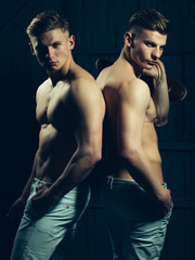 Canvas Print - Twins with muscular torso