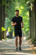 © realstock1 - The sportsman run in the beautiful park alley