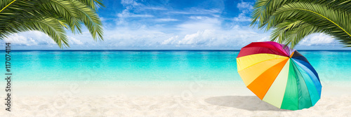 colorful parasol on tropica...