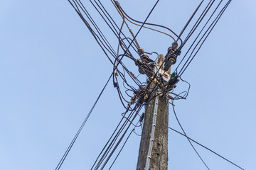 Concrete electric post with black power wire