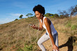 © mimagephotos - Fitness woman runner listening music on mobile phone