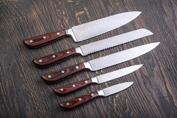 Wall Mural -  kitchen knifes on  board