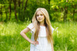 © Nadya Kolobova - Portrait cute blonde girl outdoors in summer