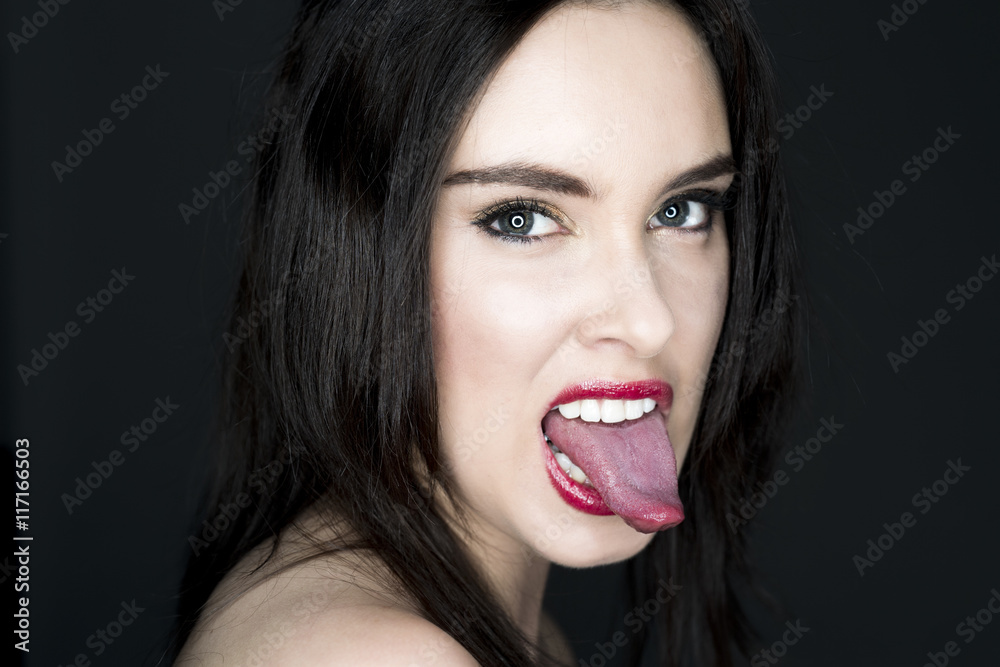 anal befriedigen als mann Frau steckt sehr lange zunge heraus Stock Photo