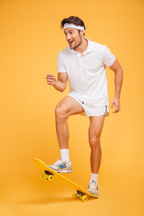 Poster - Happy young sports man skateboarding