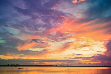 Fantastic fine orange and blue sunrise on the beach for nature background