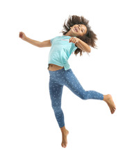 Happy African girl jumping, isolated on white